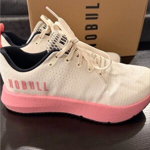 NOBULL Women's Drive Ripstop in Pink and Cream